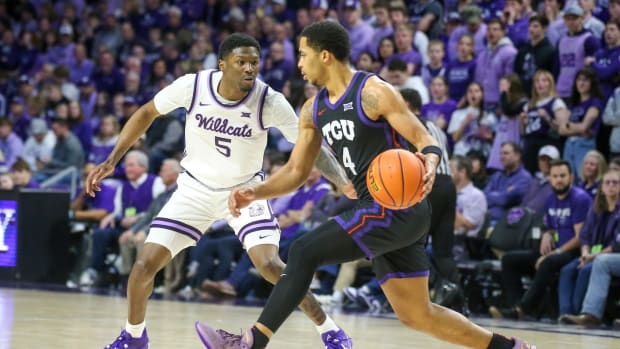 TCU Horned Frogs guard Jameer Nelson Jr. (4) is guarded by Kansas State Wildcats guard Cam Carter (5) during the first half at Bramlage Coliseum. 